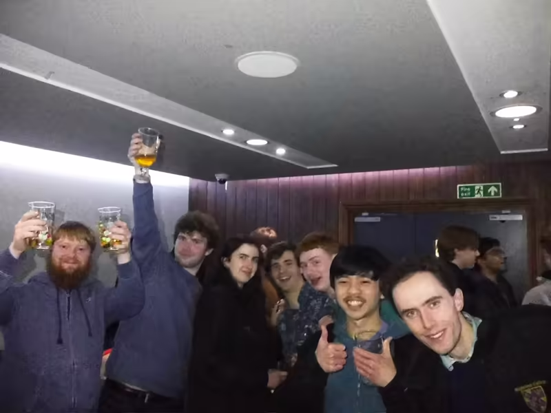 Group selfie at the bar